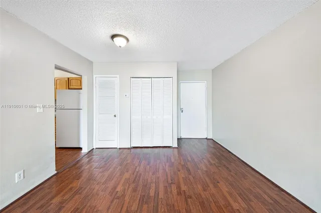 a view of a livingroom with wooden floor