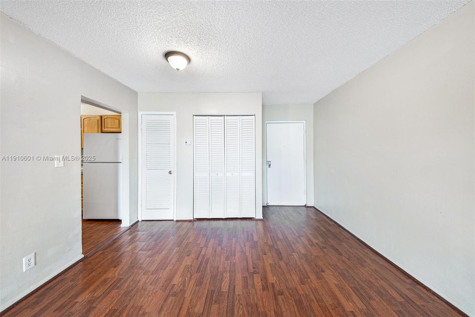405 South Pine Island Road, Unit 405D Plantation, FL 33324 - Photo 8 of 28 a view of a livingroom with wooden floor