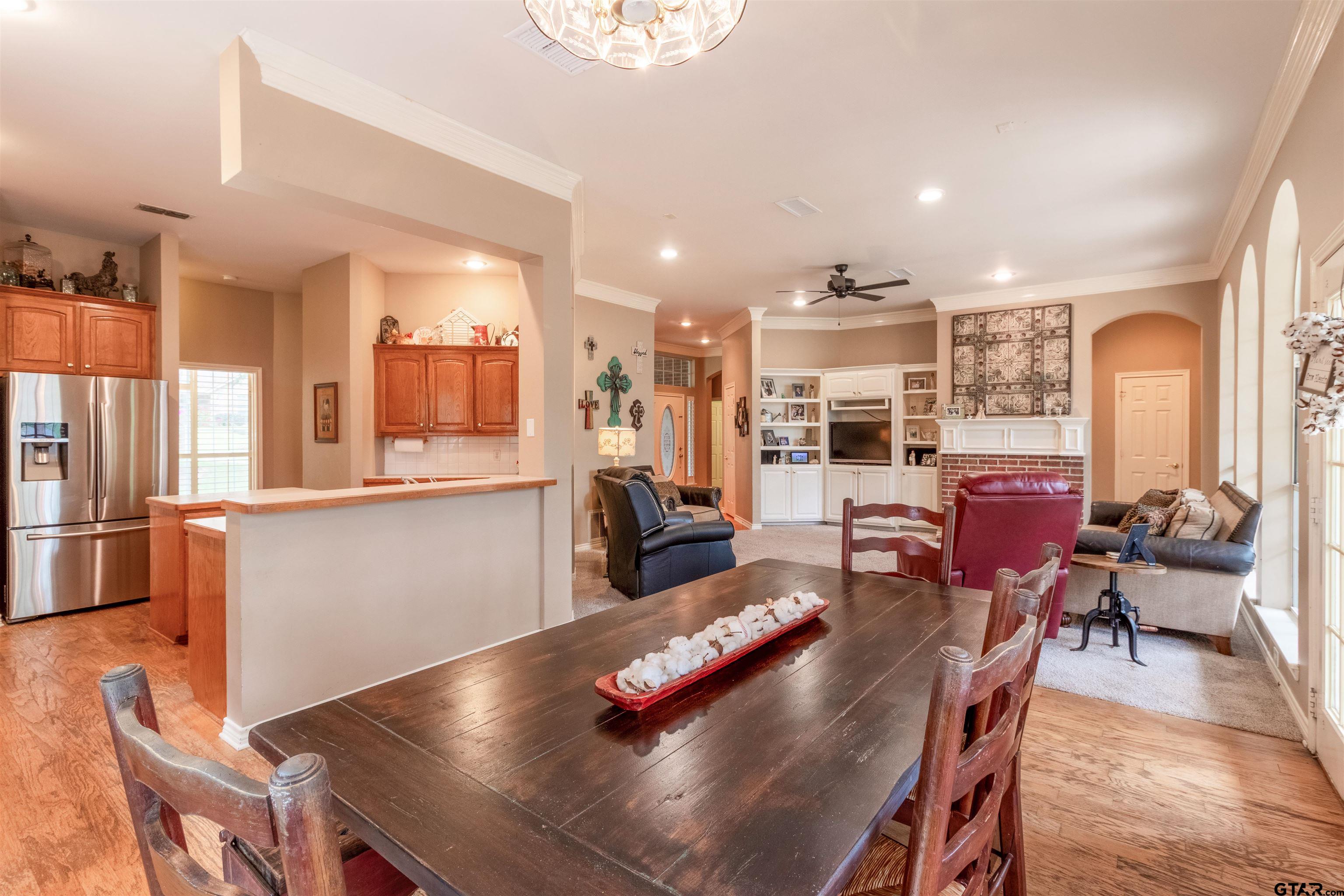 1388 Santa Fe Trail Tyler, TX 75703 - Photo 21 of 46 a living room with stainless steel appliances furniture stove and a kitchen view