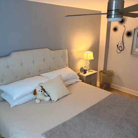 a view of a chairs and table in patio