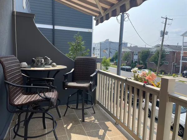 a view of a closet area with an entryway