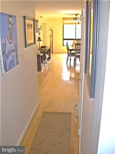 1808 Old Meadow Road, Unit 1405 McLean, VA 22102 - Photo 11 of 30 a view of a living room with windows