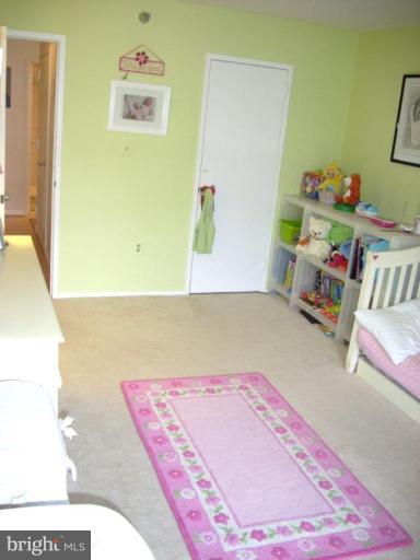 1808 Old Meadow Road, Unit 1405 McLean, VA 22102 - Photo 29 of 30 a bath room with a bed