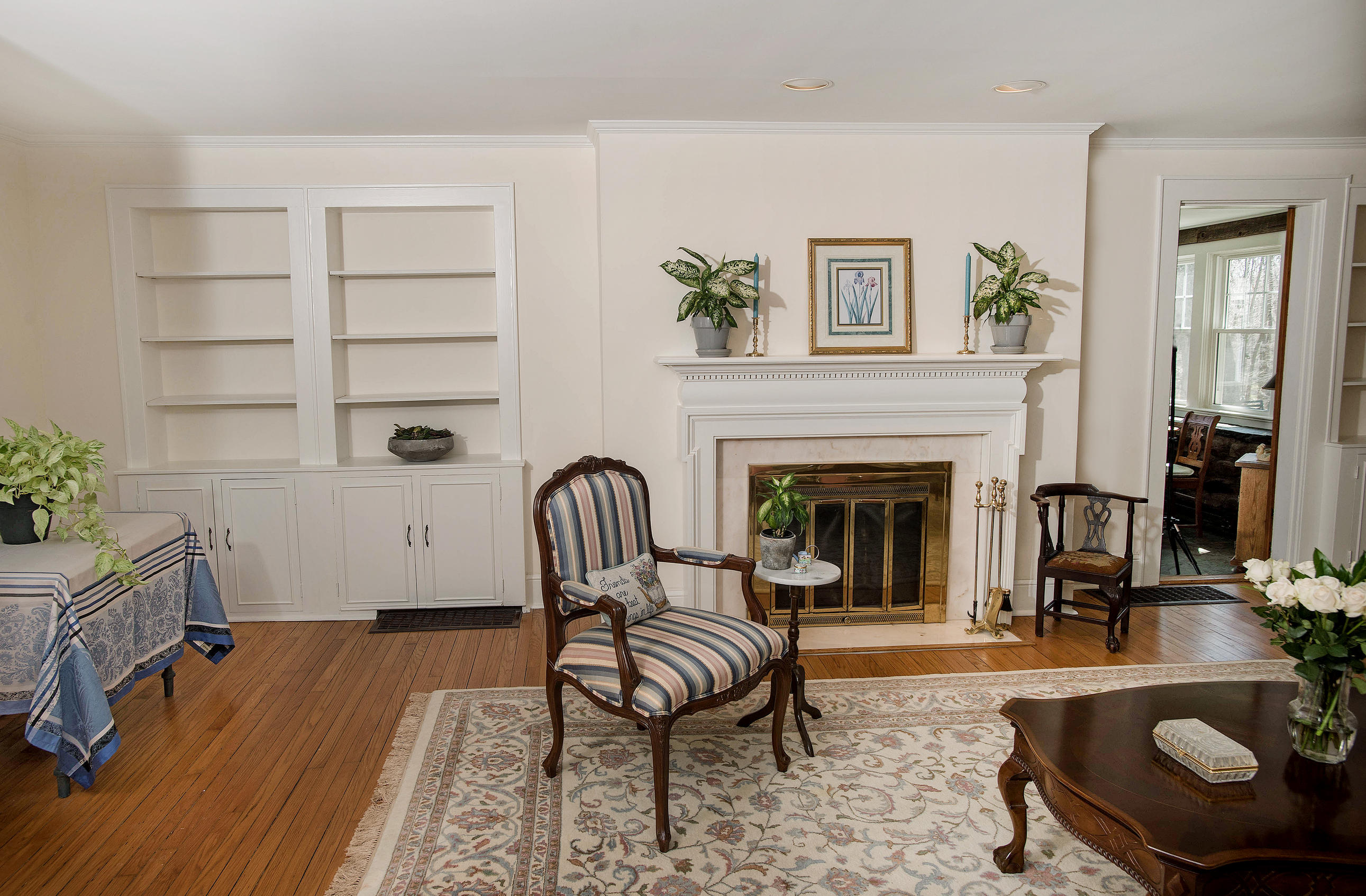 43 Marvin Ridge Road New Canaan, CT 06840 - Photo 11 of 41 a living room with furniture and a fireplace