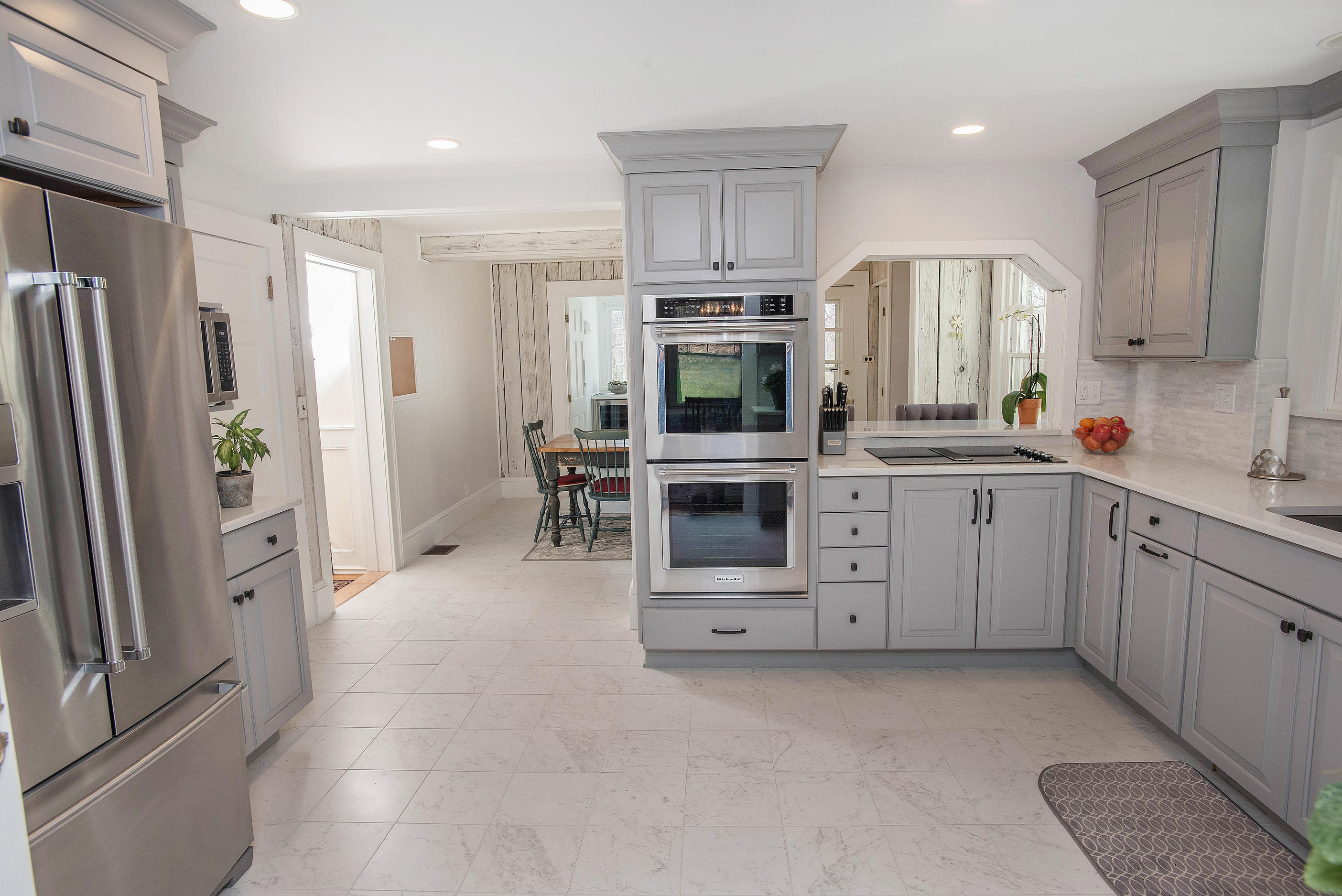 43 Marvin Ridge Road New Canaan, CT 06840 - Photo 13 of 41 a kitchen with white cabinets and stainless steel appliances