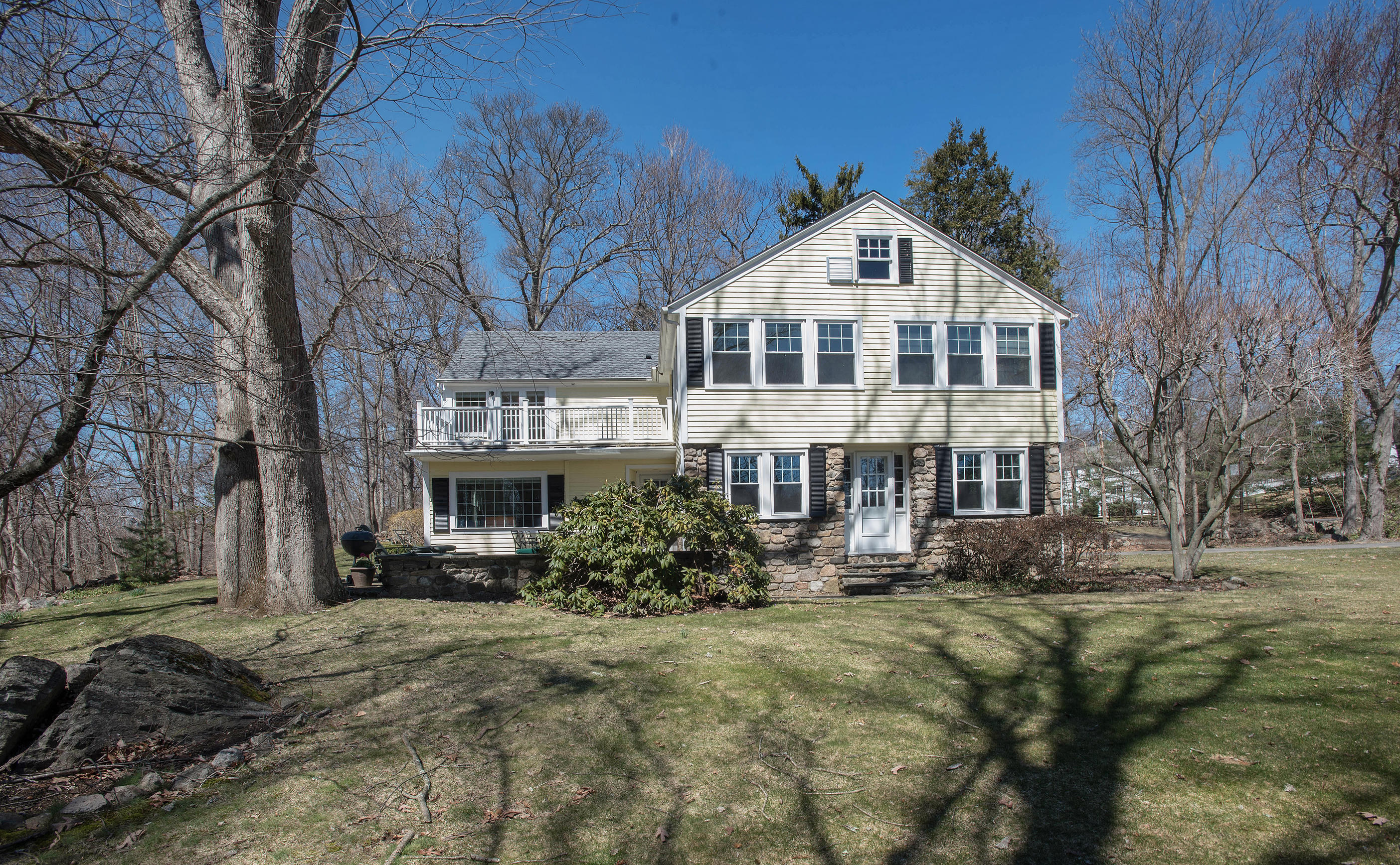 43 Marvin Ridge Road New Canaan, CT 06840 - Photo 2 of 41 a front view of a building with a yard