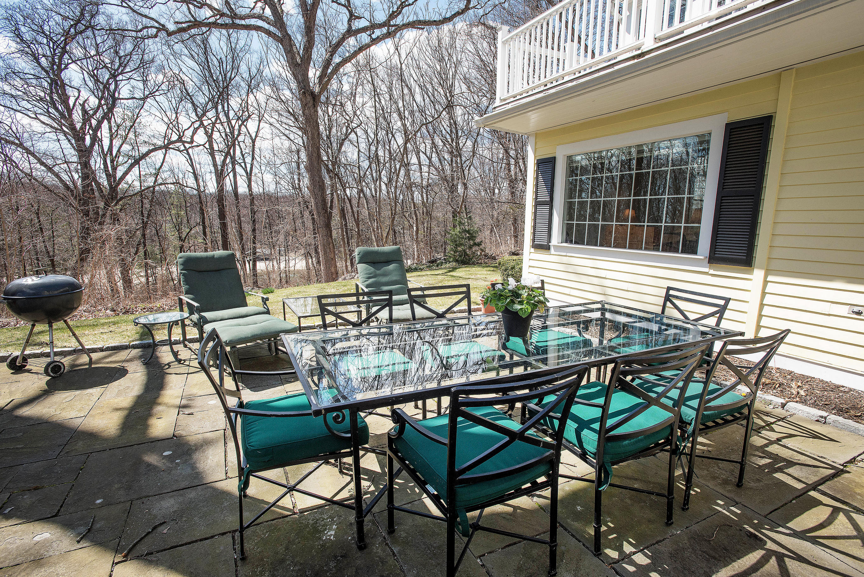 43 Marvin Ridge Road New Canaan, CT 06840 - Photo 25 of 41 a view of a chairs and table in the patio