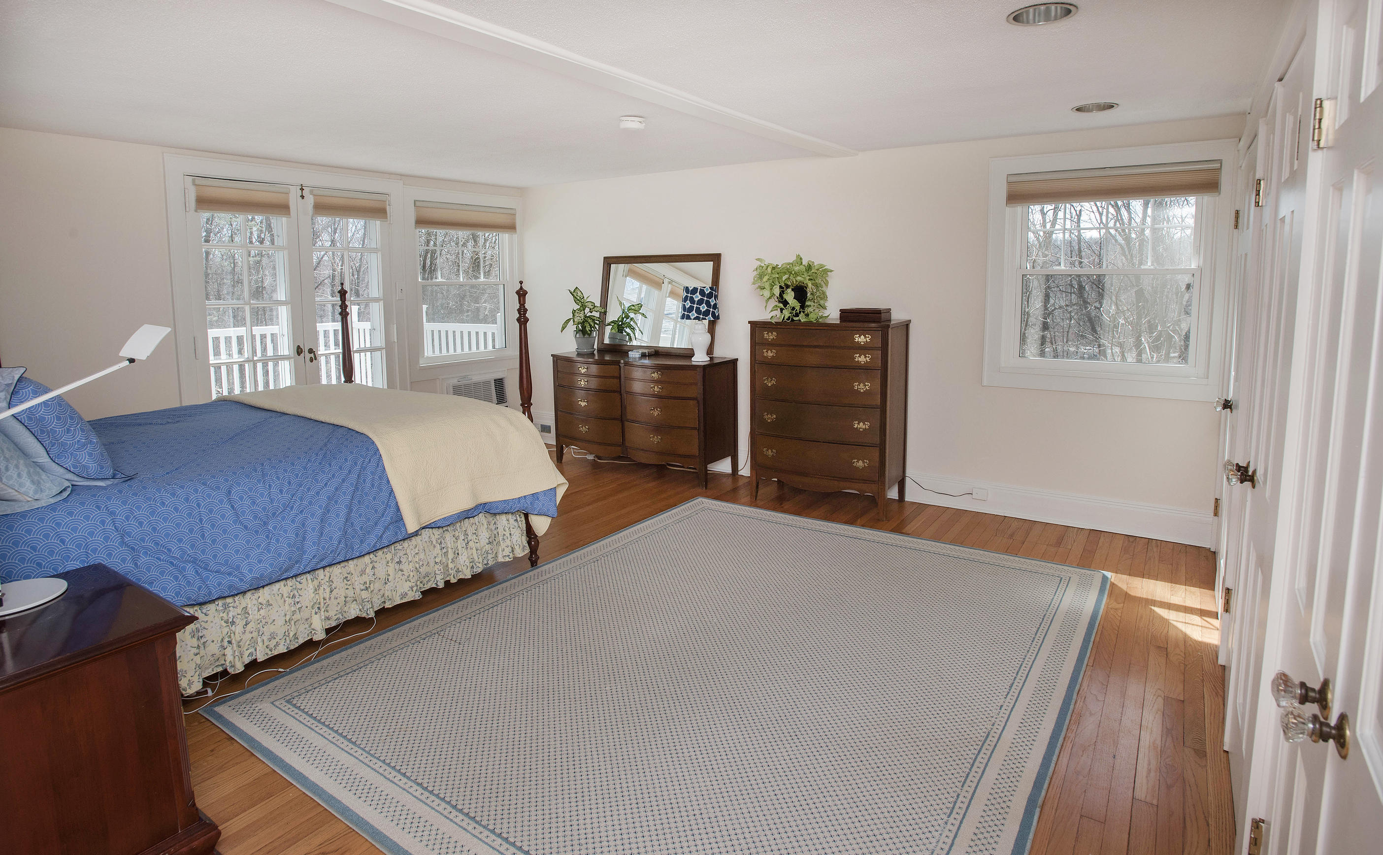 43 Marvin Ridge Road New Canaan, CT 06840 - Photo 28 of 41 a bedroom with bed and wooden floor