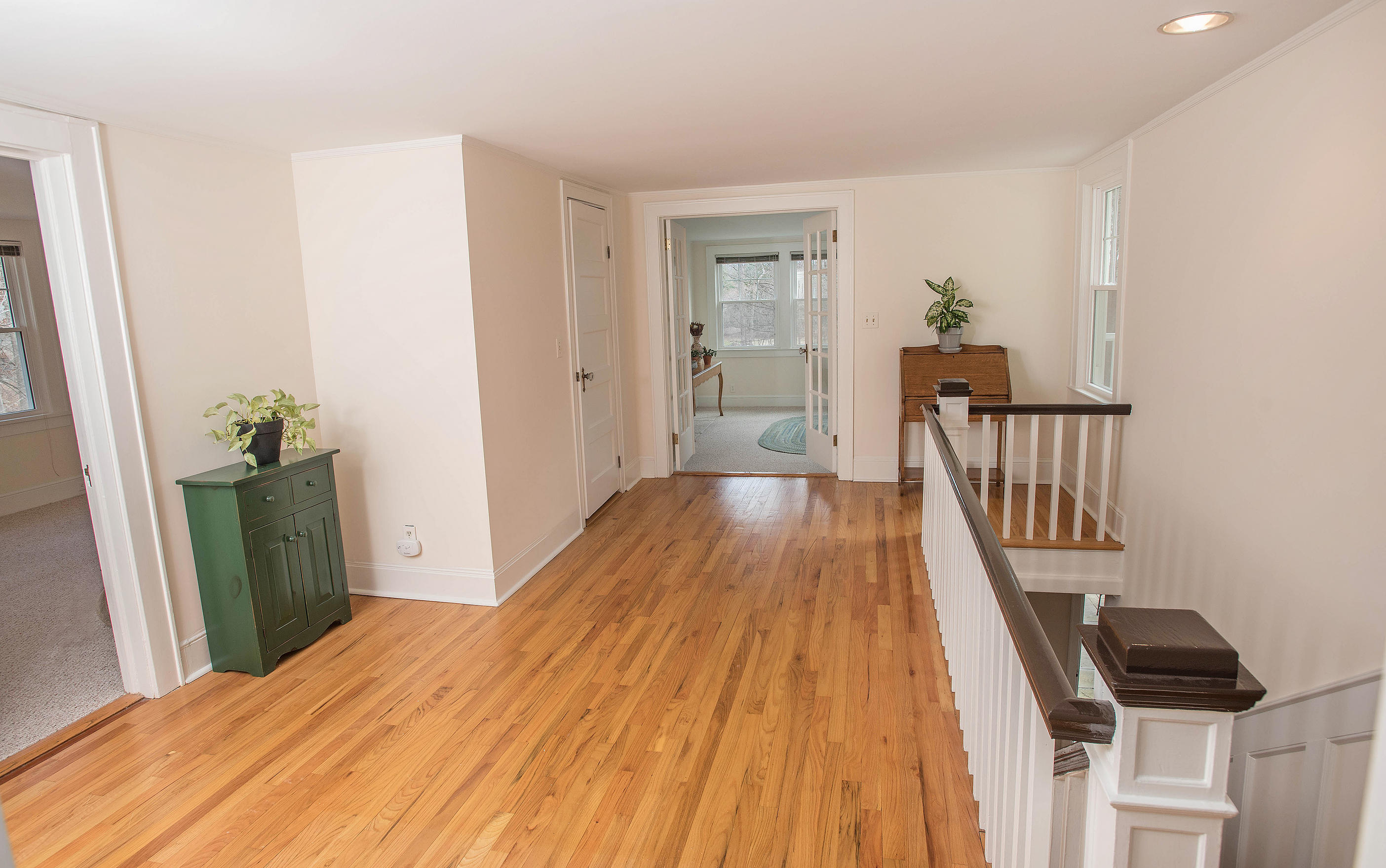 43 Marvin Ridge Road New Canaan, CT 06840 - Photo 33 of 41 a bedroom with a bed and wooden floor