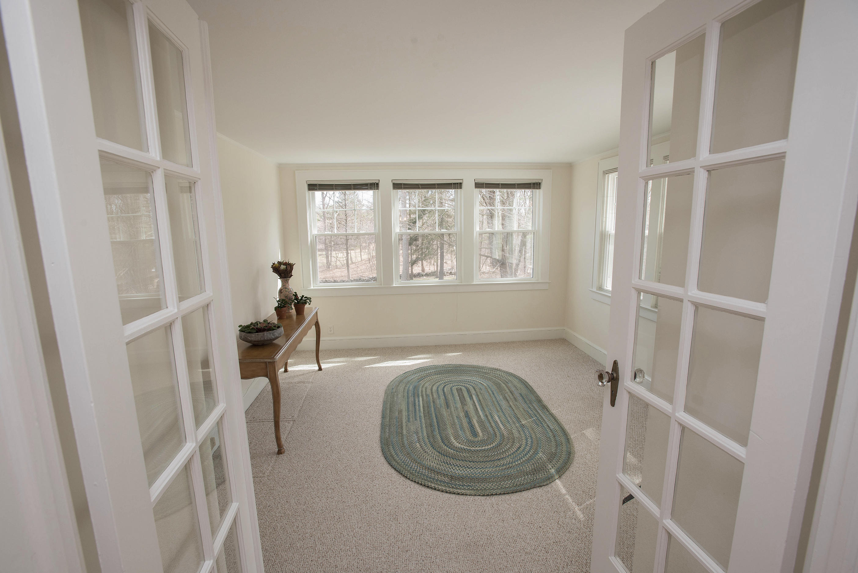 43 Marvin Ridge Road New Canaan, CT 06840 - Photo 34 of 41 a spacious bedroom with a bed and a window
