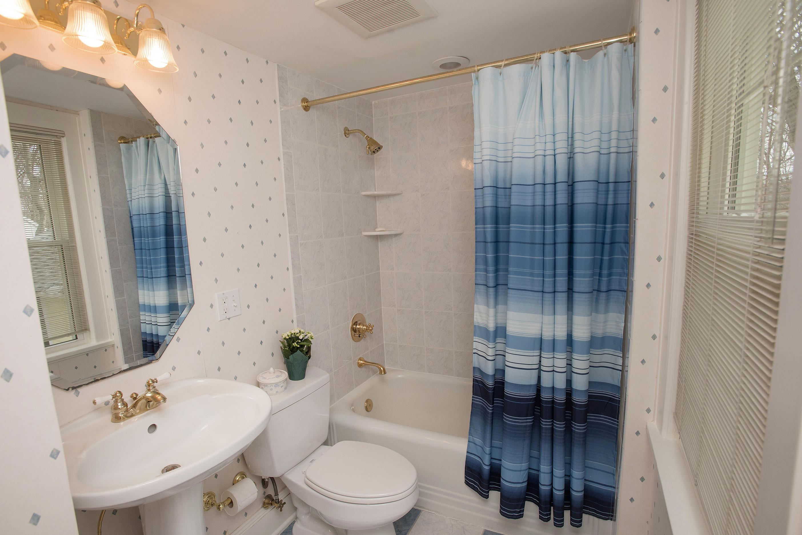 43 Marvin Ridge Road New Canaan, CT 06840 - Photo 37 of 41 a bathroom with a sink toilet and shower