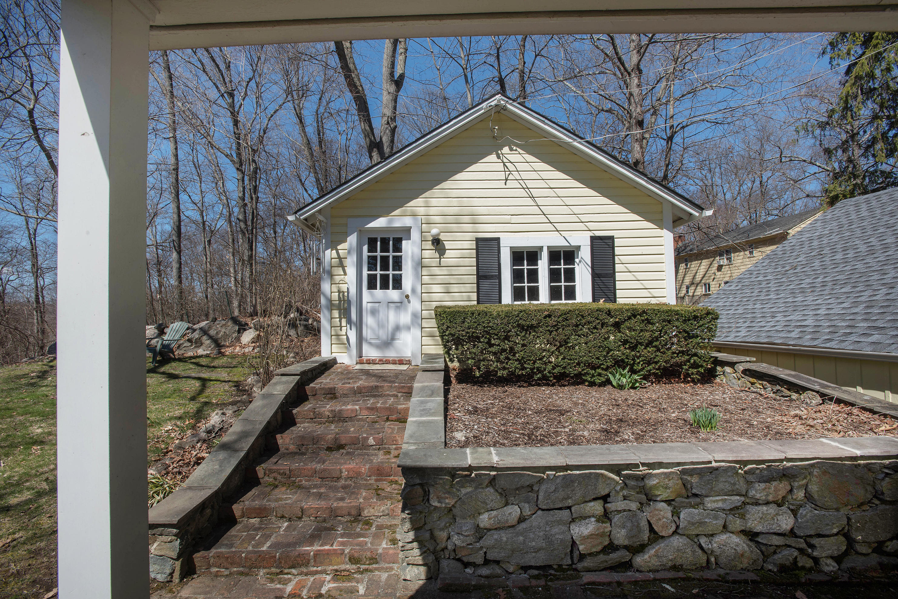 43 Marvin Ridge Road New Canaan, CT 06840 - Photo 5 of 41 a front view of a house with garden