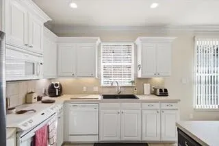 a view of a center island and dining table