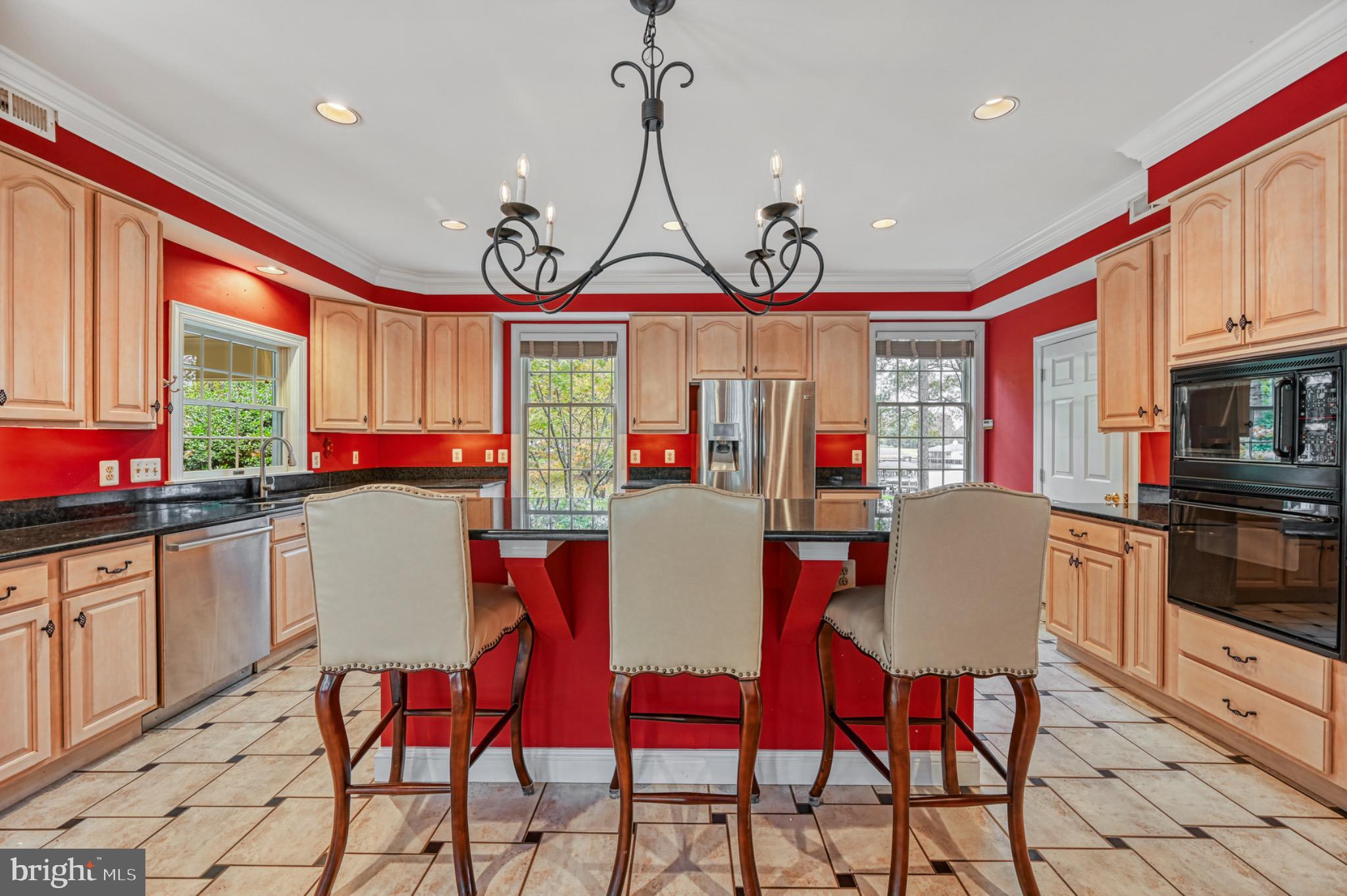 175 Covenant Way Bumpass, VA 23024 - Photo 11 of 140 Vibrant kitchen with elegant design elements.