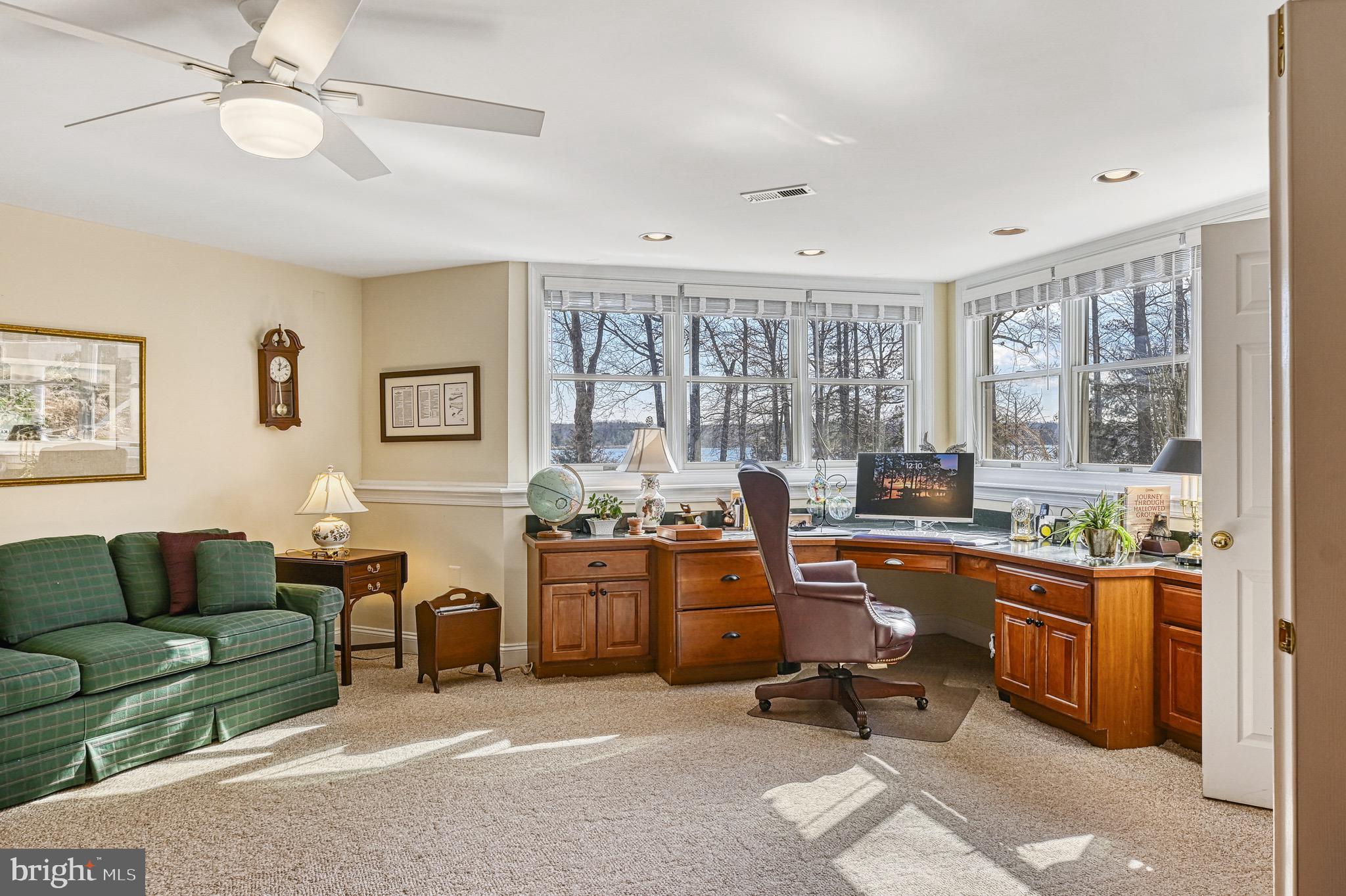 175 Covenant Way Bumpass, VA 23024 - Photo 140 of 140 a view of a livingroom with workspace and a couch