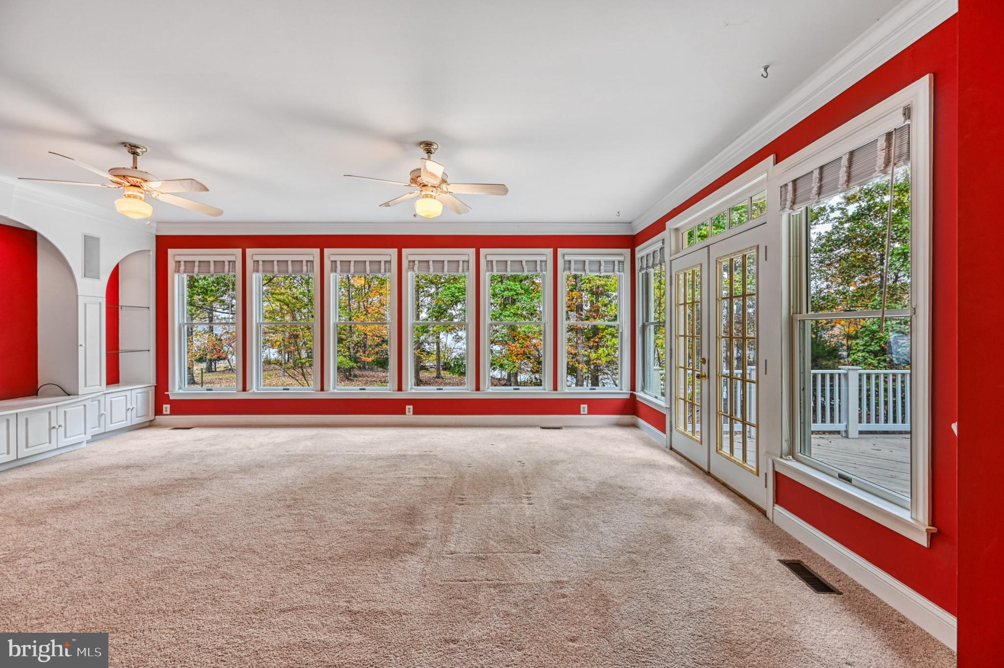 175 Covenant Way Bumpass, VA 23024 - Photo 19 of 140 Bright, airy family room with lake views.
