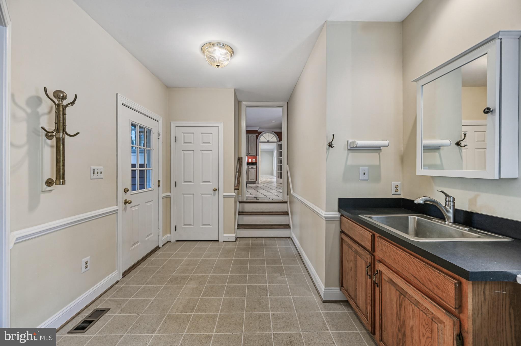 175 Covenant Way Bumpass, VA 23024 - Photo 22 of 140 Convenient mud room with front yard & deck access.