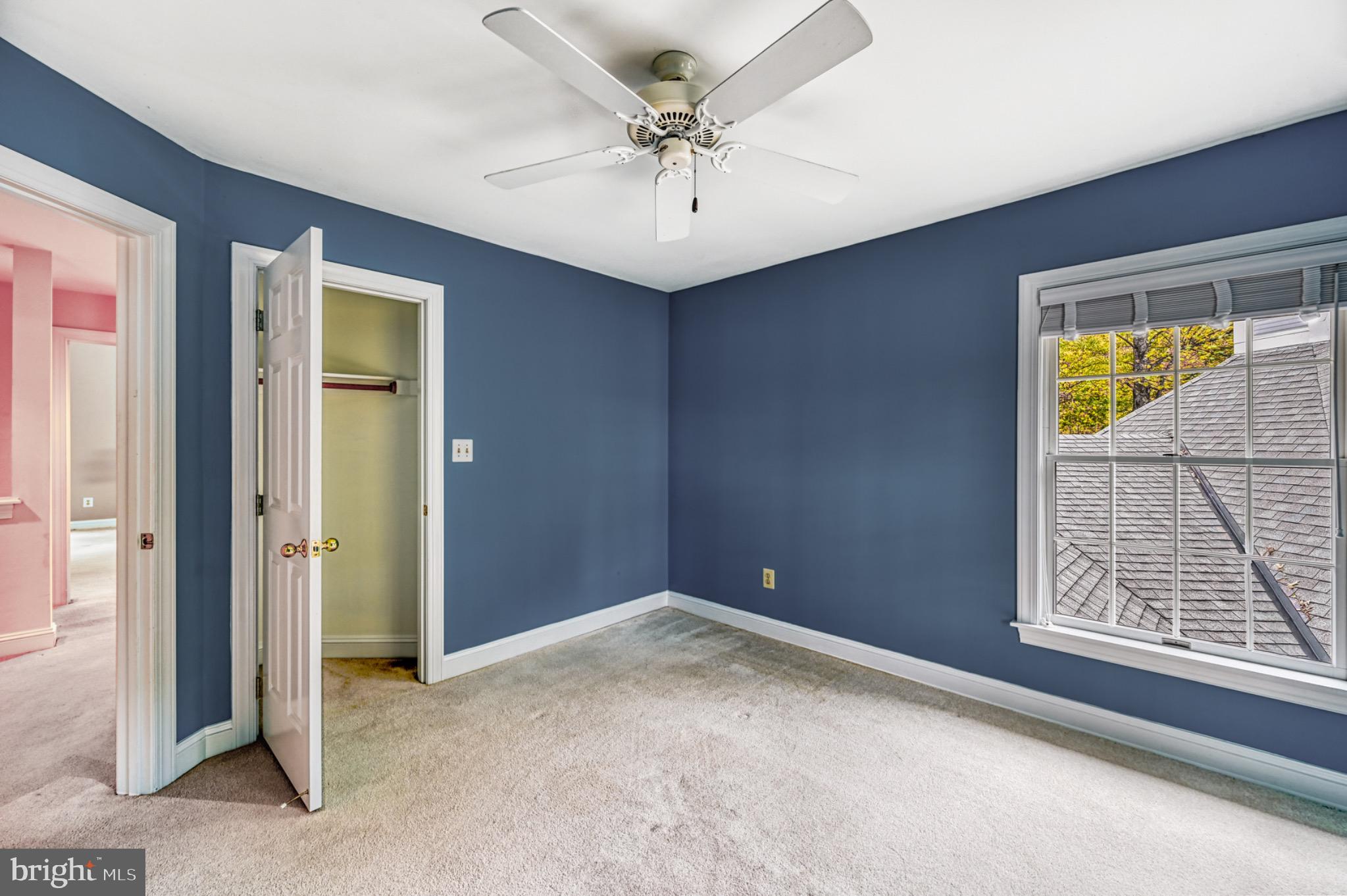 175 Covenant Way Bumpass, VA 23024 - Photo 32 of 140 Bright bedroom with natural light and lake view.