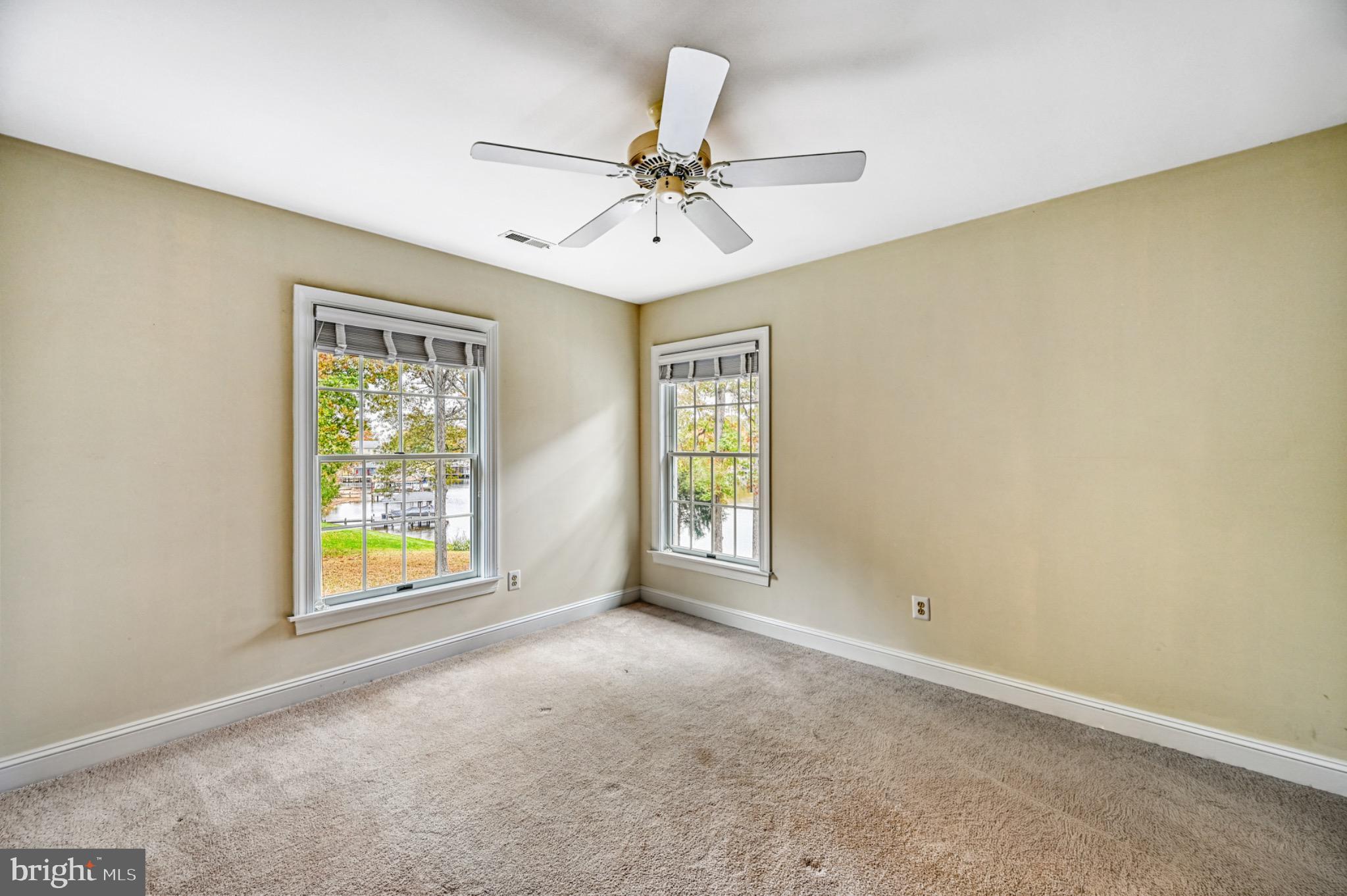175 Covenant Way Bumpass, VA 23024 - Photo 33 of 140 Bright and airy bedroom with lake views.