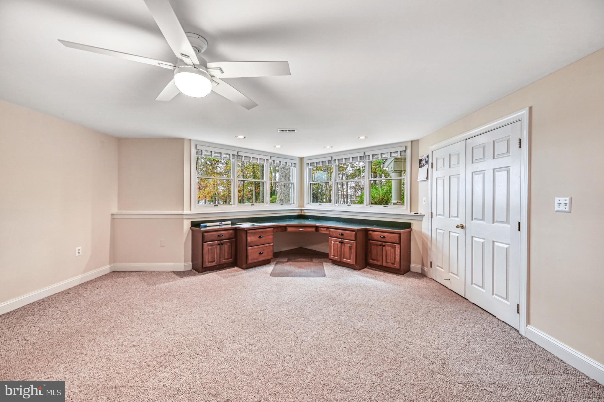 175 Covenant Way Bumpass, VA 23024 - Photo 41 of 140 a living room with furniture and a large window