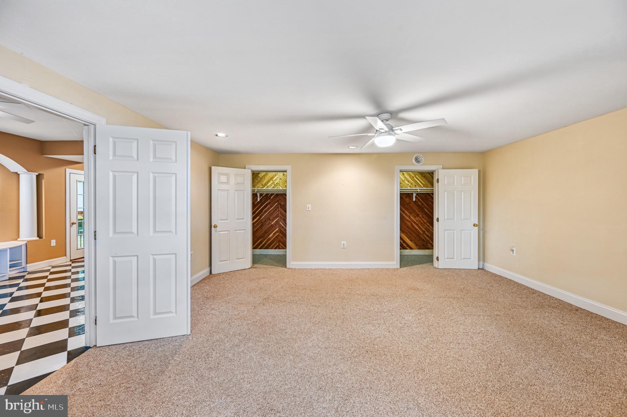 175 Covenant Way Bumpass, VA 23024 - Photo 43 of 140 Lower Level bedroom with two spacious cedar closet