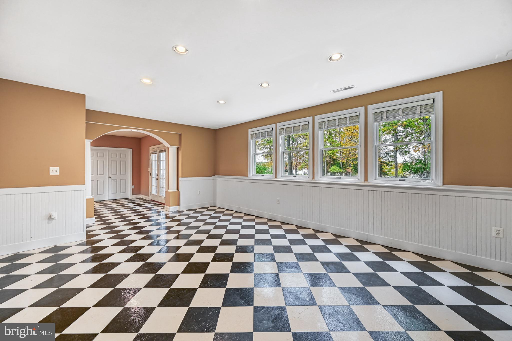 175 Covenant Way Bumpass, VA 23024 - Photo 47 of 140 Spacious room with striking checkered floors.