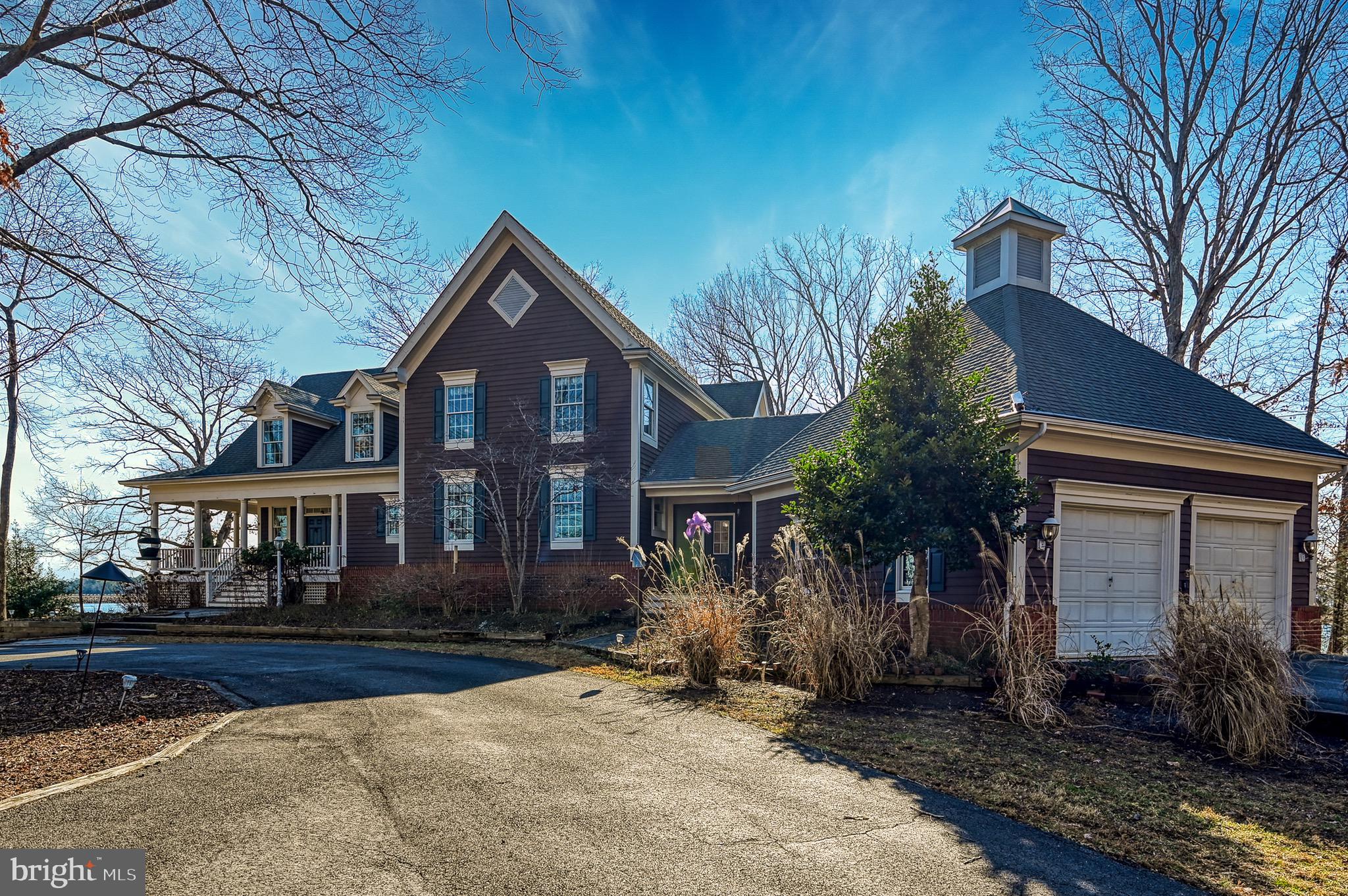 175 Covenant Way Bumpass, VA 23024 - Photo 54 of 140 a front view of a house with a yard and tree s