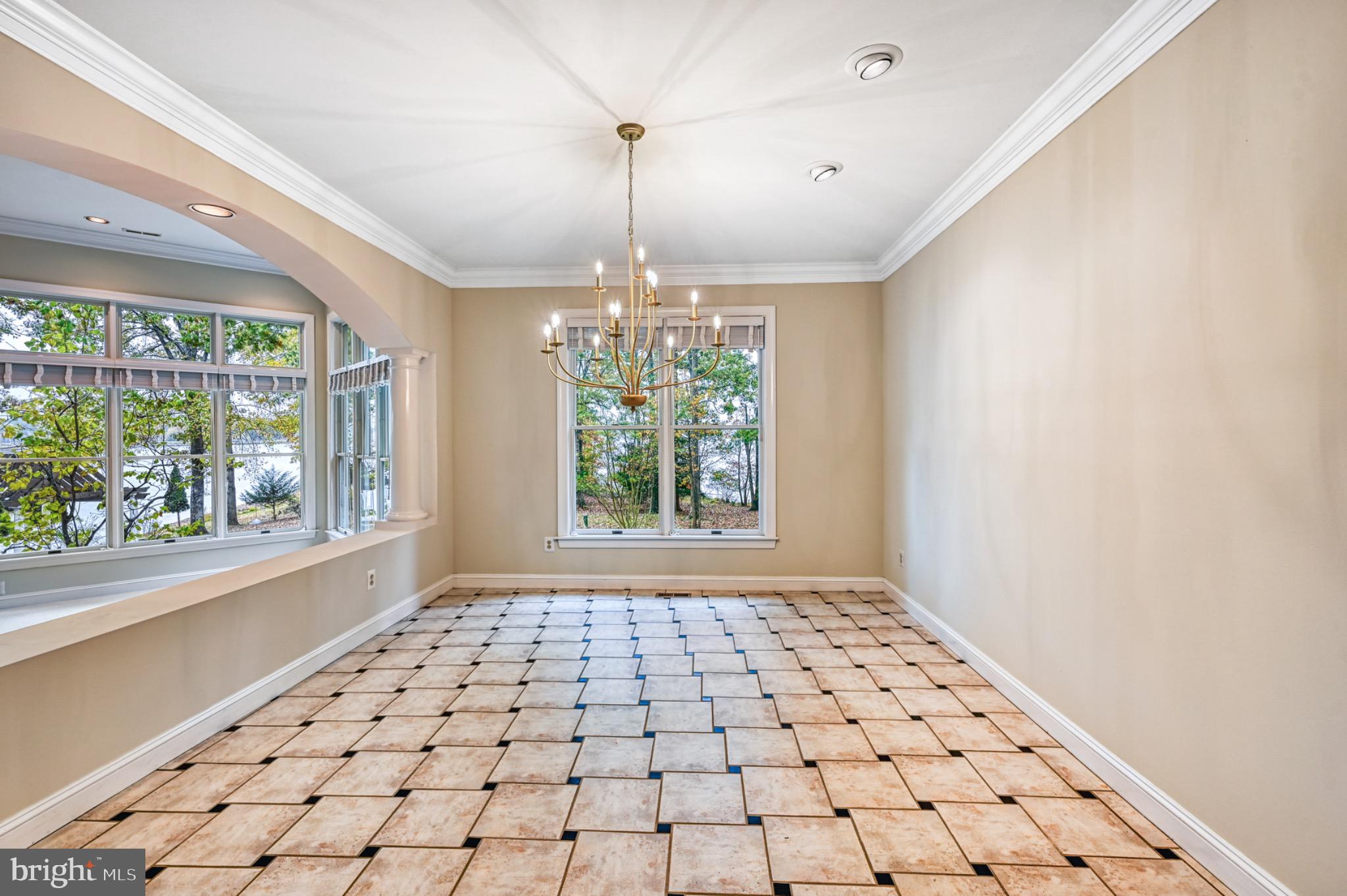 175 Covenant Way Bumpass, VA 23024 - Photo 8 of 140 Bright, airy dining space with elegant lighting.