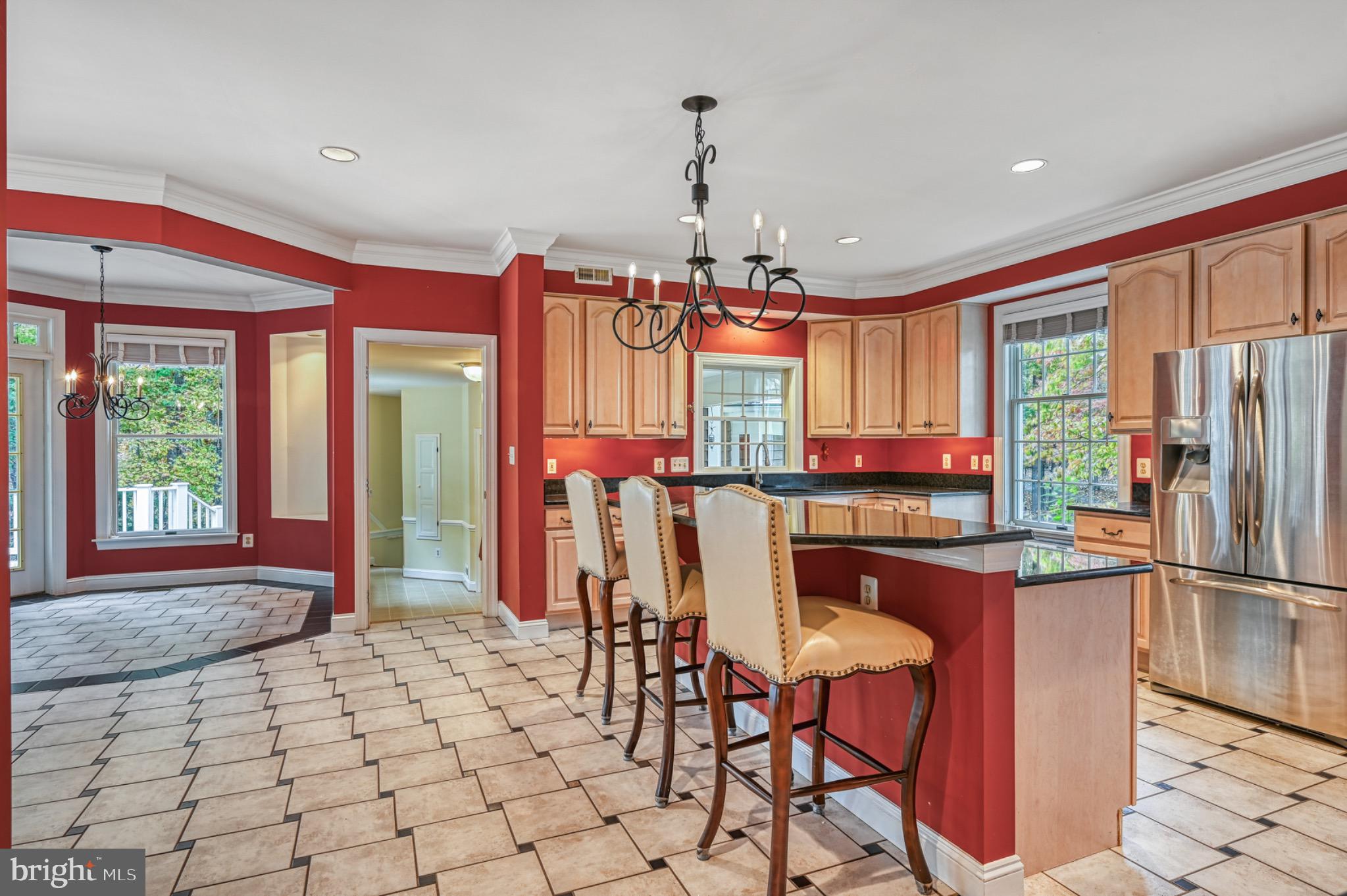 175 Covenant Way Bumpass, VA 23024 - Photo 10 of 140 Vibrant kitchen with elegant design elements.