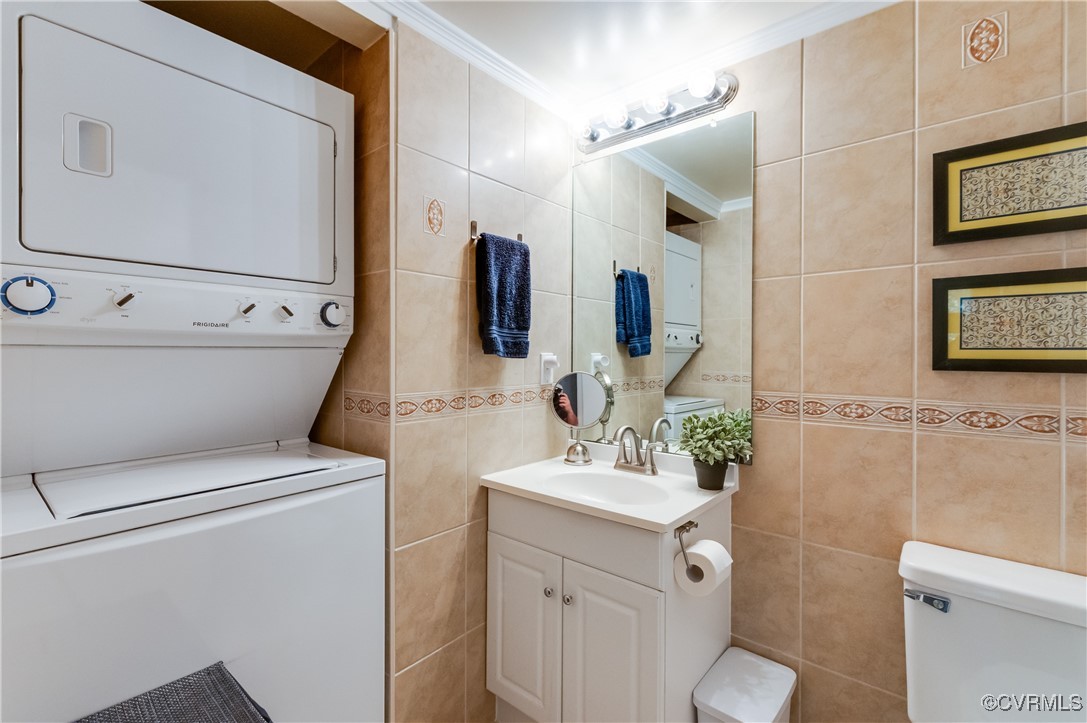 1507 Regency Woods Road, Unit 103 Henrico, VA 23238 - Photo 14 of 32 Bathroom featuring stacked washer and clothes drye