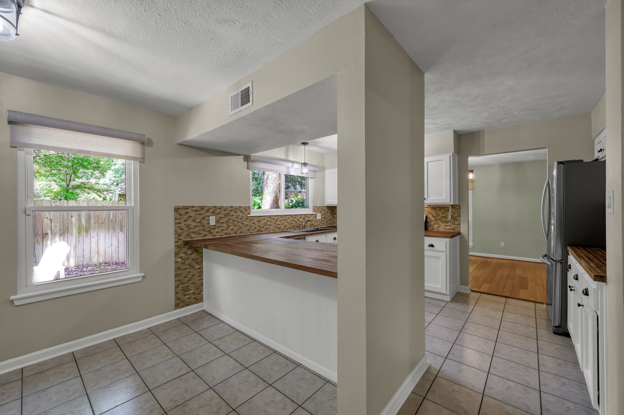 12224 Gun Oak Place Spring, TX 77380 - Photo 25 of 37 Open Kitchen and Breakfast Area with Easy Flow to the Main Living Spaces