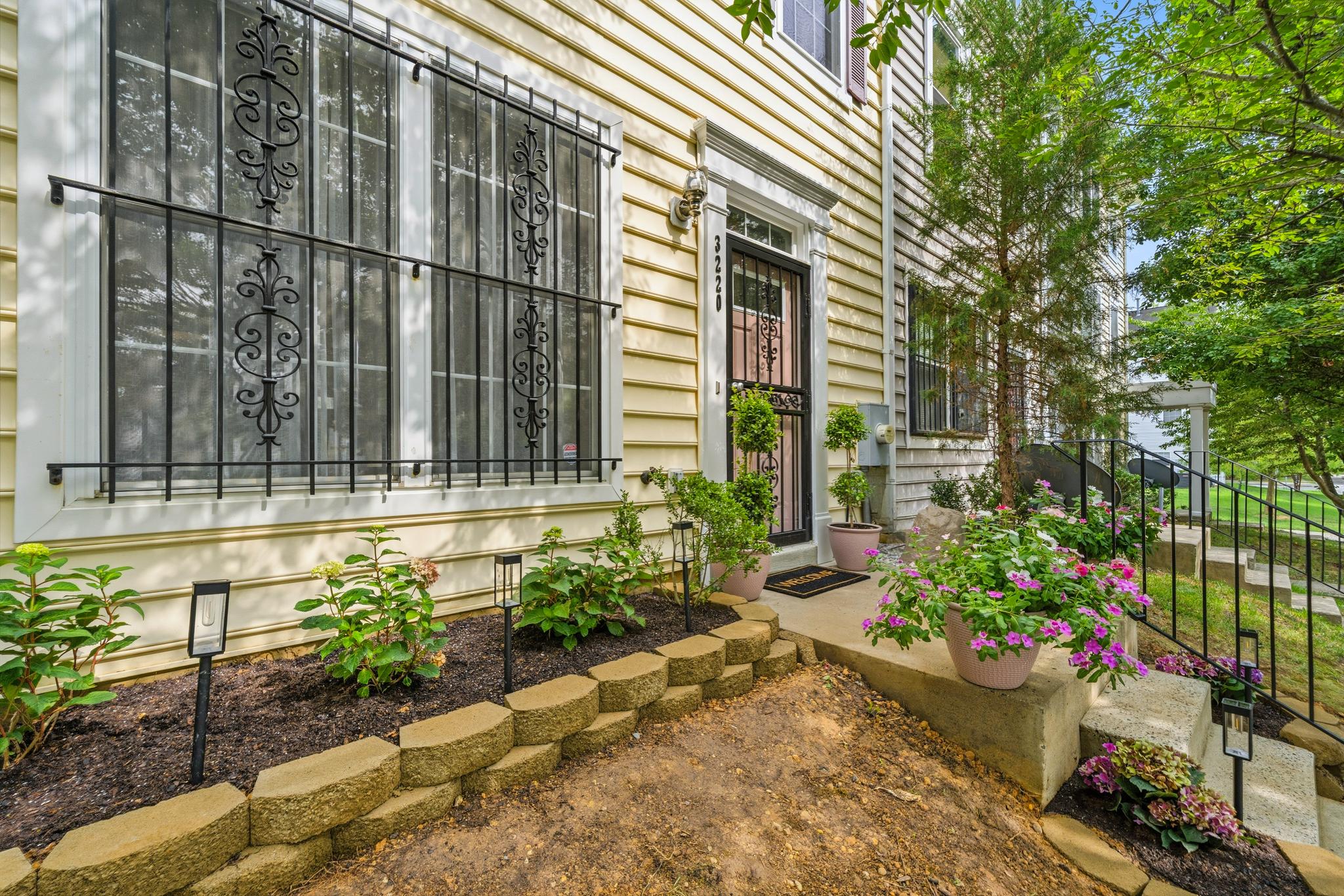 3220 15th Place Southeast Washington, DC 20020 - Photo 4 of 34 Flower bed with flowering hydrangeas