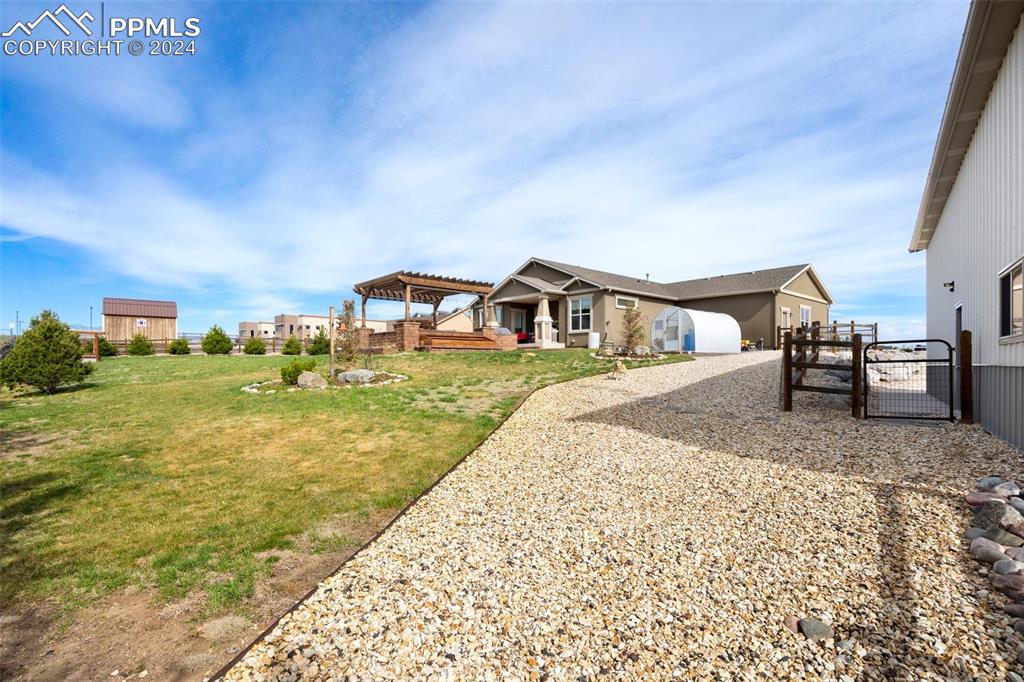 11501 Palmers Green Drive Peyton, CO 80831 - Photo 13 of 49 a view of a swimming pool with outdoor space