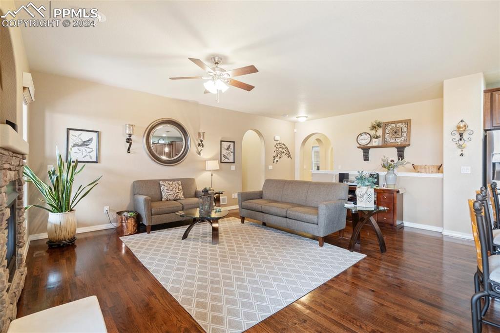 11501 Palmers Green Drive Peyton, CO 80831 - Photo 20 of 49 a living room with furniture and wooden floor