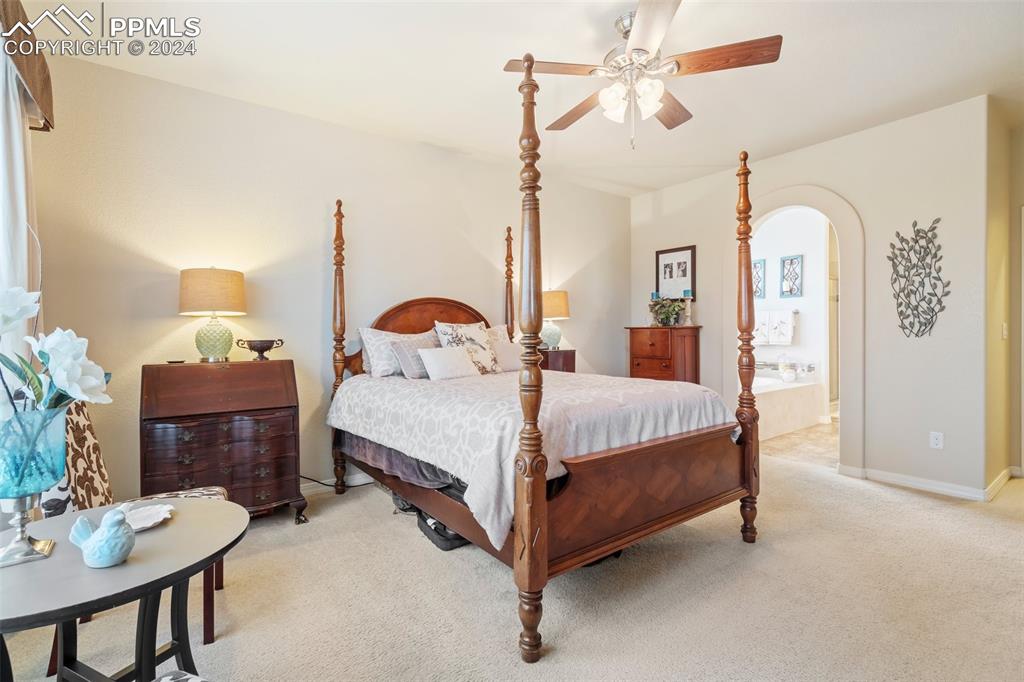 11501 Palmers Green Drive Peyton, CO 80831 - Photo 31 of 49 a bedroom with a bed and a table