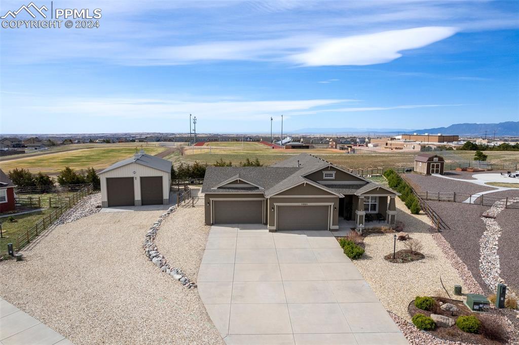 11501 Palmers Green Drive Peyton, CO 80831 - Photo 5 of 49 a view of a terrace with chairs