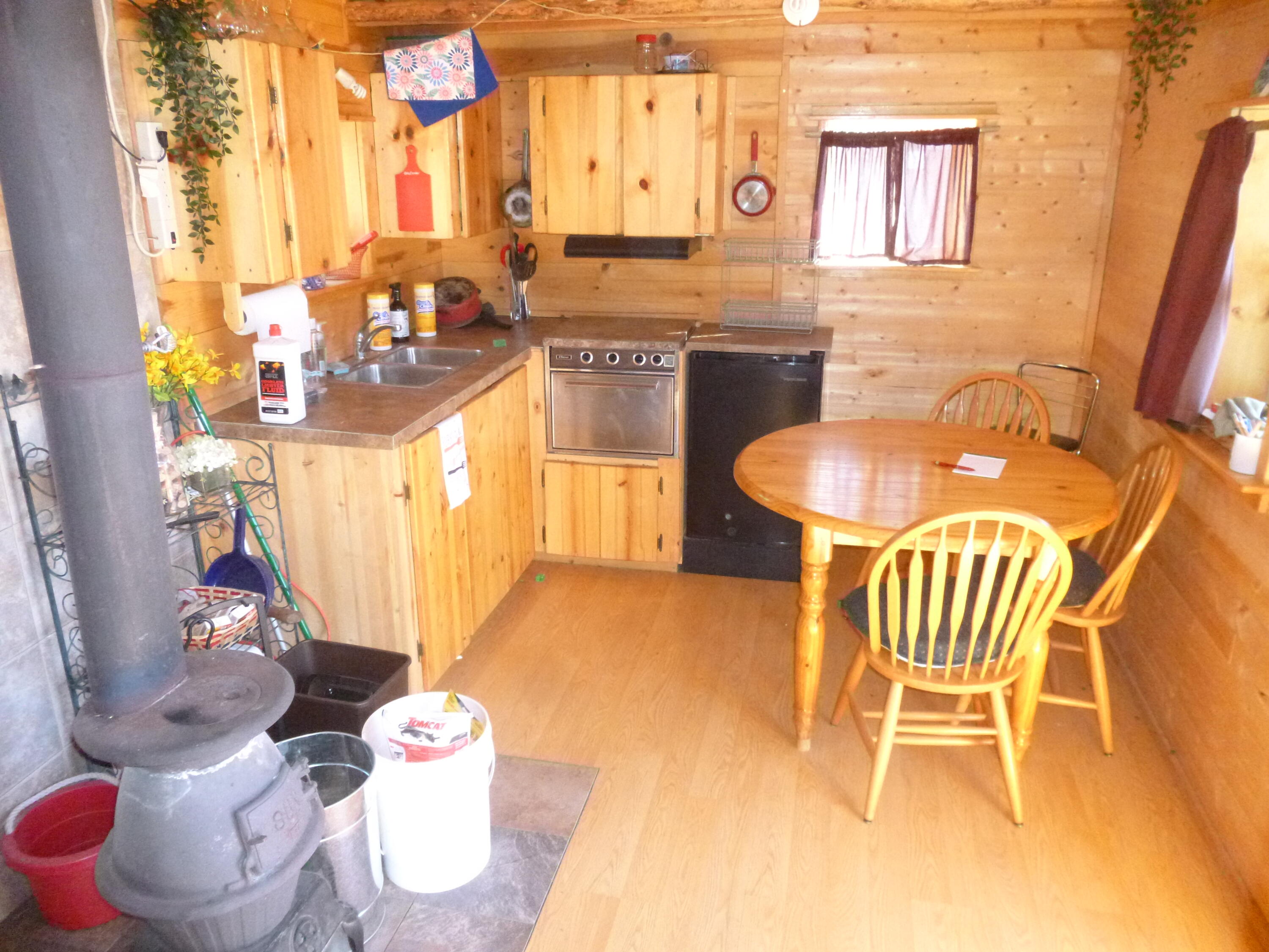 0 Kay Street, Unit 18 Chiloquin, OR 97624 - Photo 12 of 25 a dining room with furniture and wooden floor