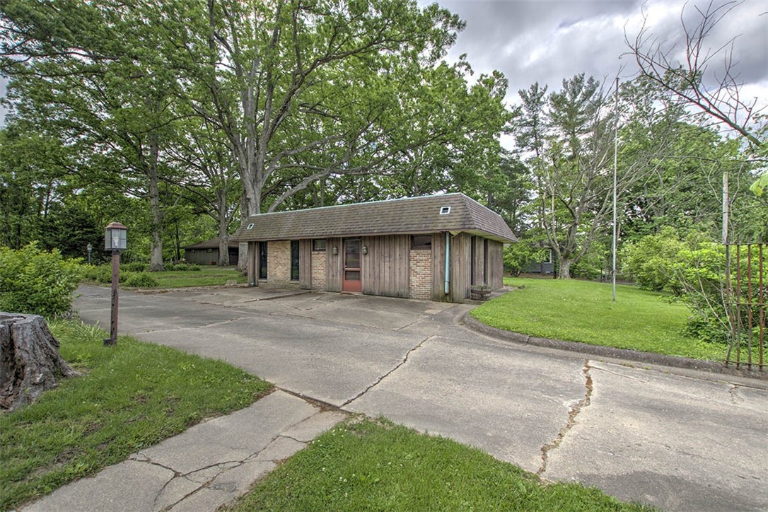 4480 Fort Daniel Road Decatur, IL 62521 - Photo 18 of 34 a front view of a house with a yard