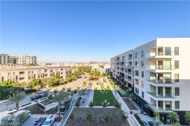 a view of a hallway with washer and dryer