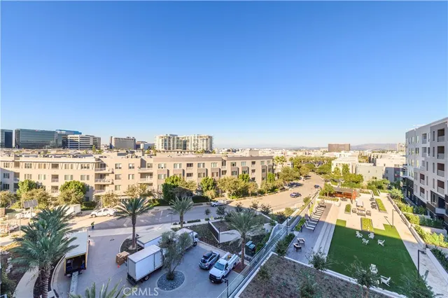 a view of a city with tall buildings