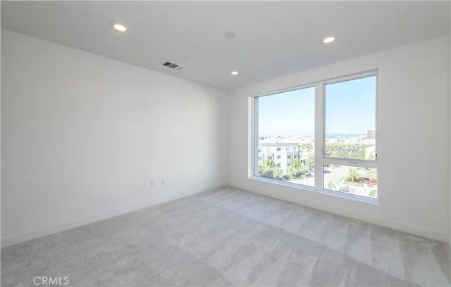 a view of a garden with a patio