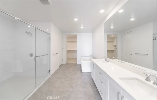 a view of a patio with a table and chairs