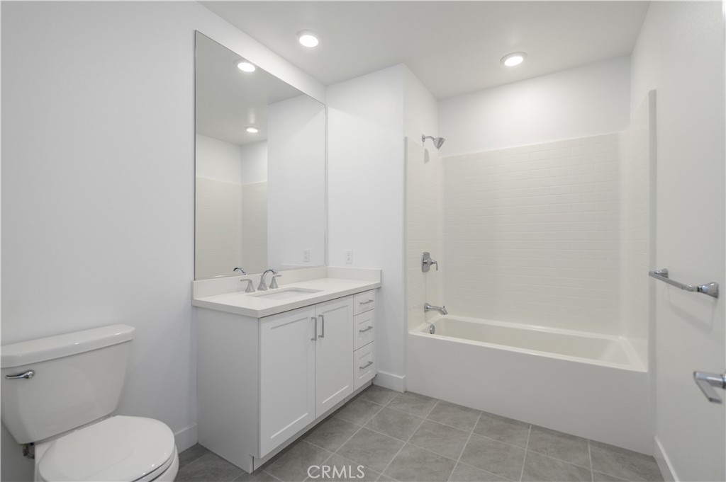 3608 Rivington Irvine, CA 92612 - Photo 34 of 53 a bathroom with a sink a toilet and shower