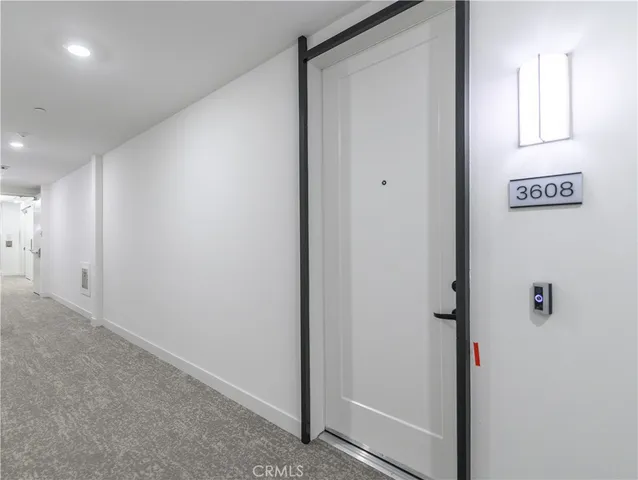 a view of kitchen with wooden floor