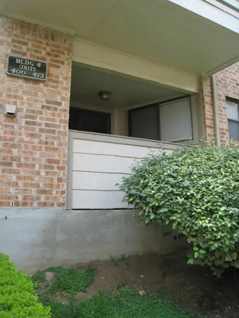a view of a backyard of the house