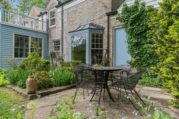 a view of chair and table in the patio