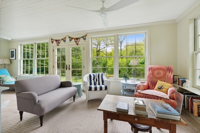 259 Ravine Drive Highland Park, IL 60035 - Photo 7 of 33 a living room with furniture and a large window