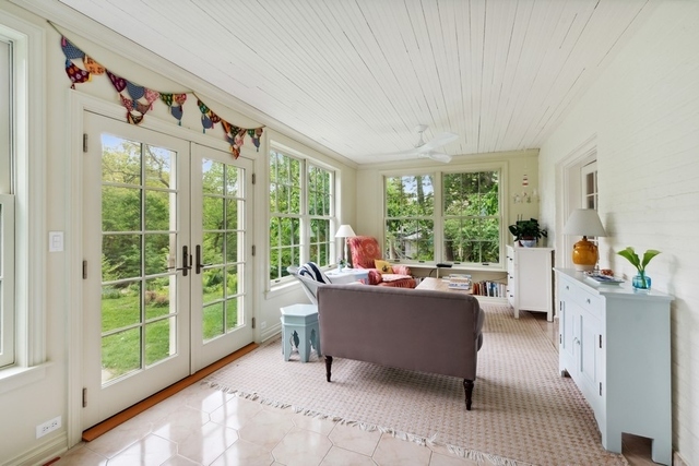 259 Ravine Drive Highland Park, IL 60035 - Photo 9 of 33 a living room with furniture and a large window