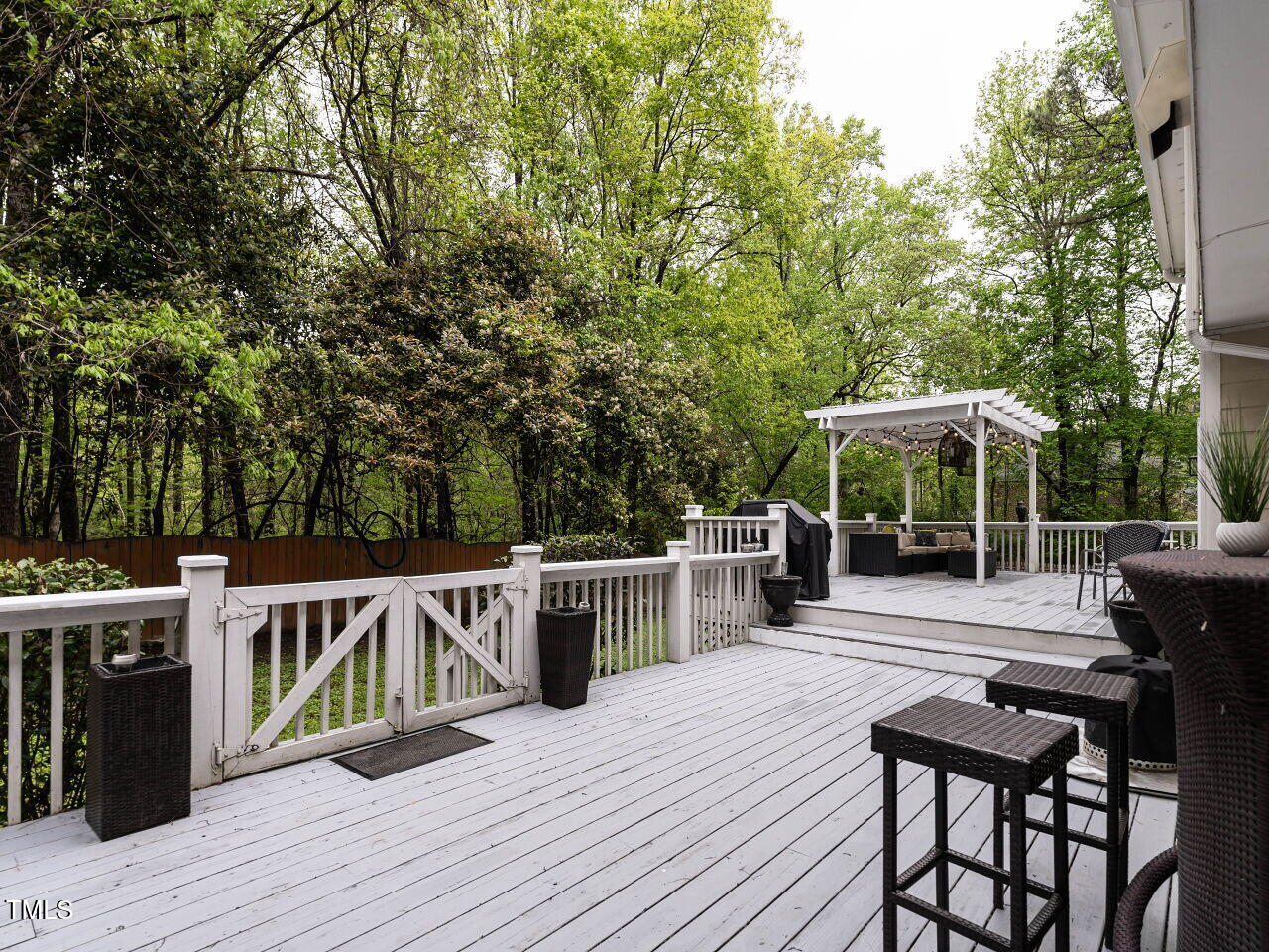 8805 Stage Ford Road Raleigh, NC 27615 - Photo 31 of 45 Huge custom-built deck spans the back of the home.