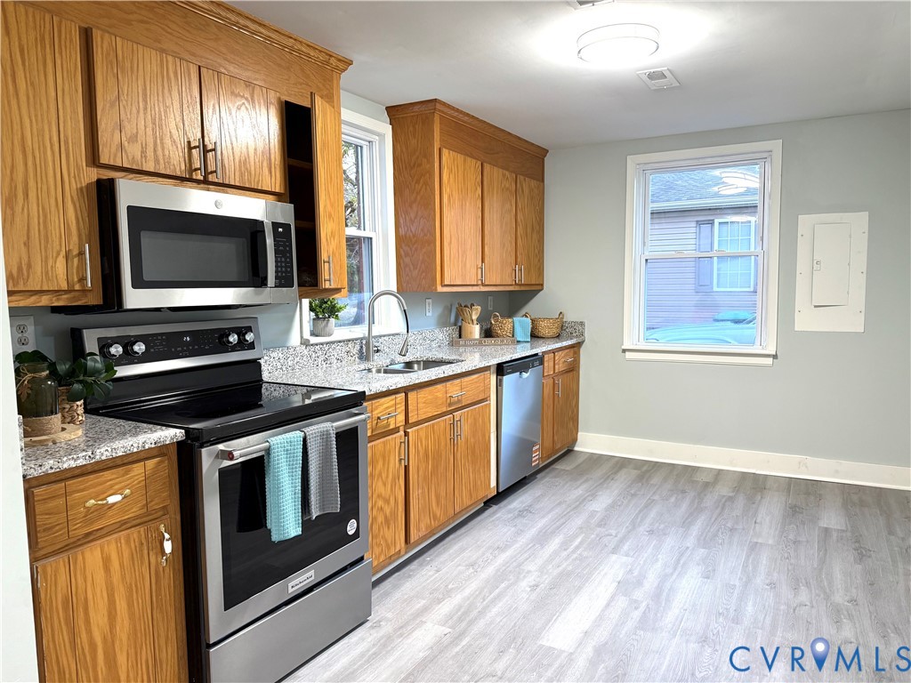 1748 Youngs Road Petersburg, VA 23803 - Photo 11 of 25 Kitchen with stainless steel appliances, light sto